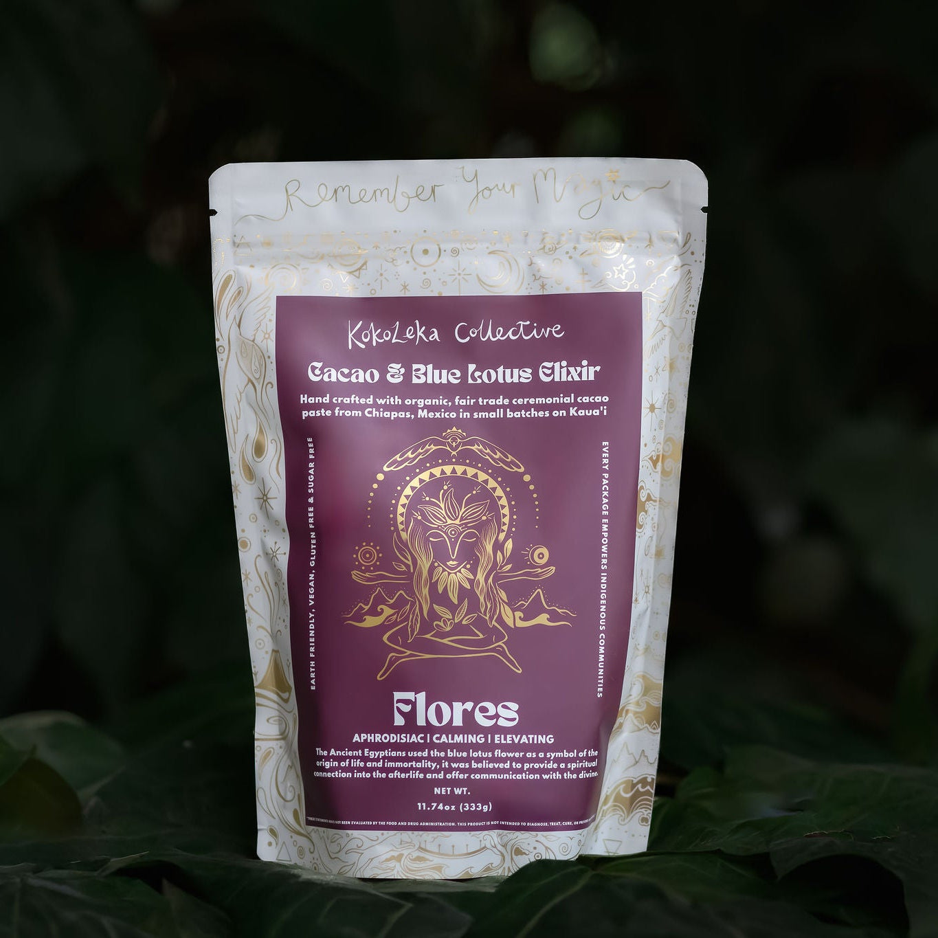 Cacao and blue corn flour package with a purple label on a dark leafy background