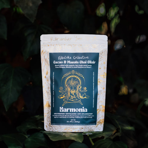 Packaged product with a blue label on a dark leafy background